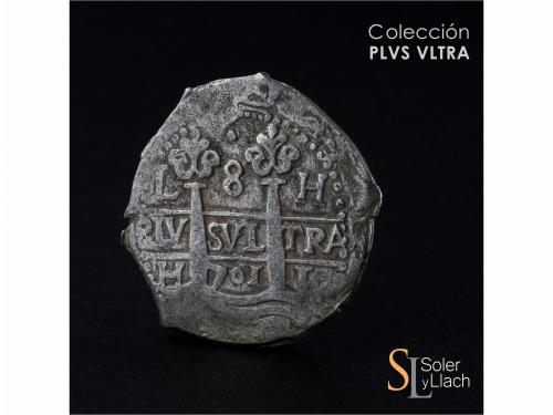 CARLOS II. 8 Reales. 1701. LIMA. H. 27,37 grs. Dos fechas vi