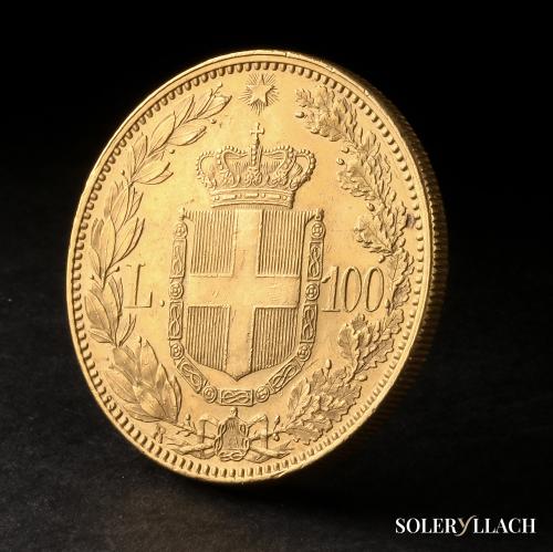 ITALIA. 100 Lire. 1883-R. UMBERTO I. 32,18 grs. AU. (Rayitas