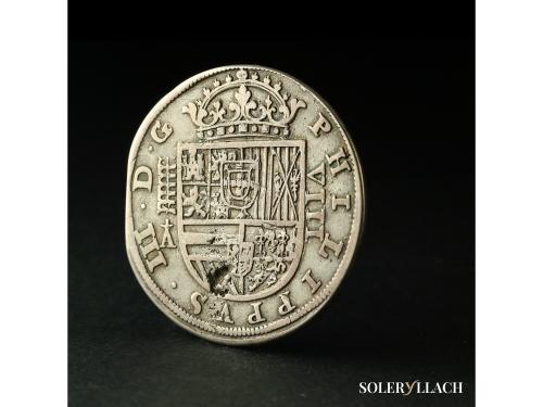 FELIPE III. 8 Reales. 1617. SEGOVIA. A cruz encima. Anv.: Ac
