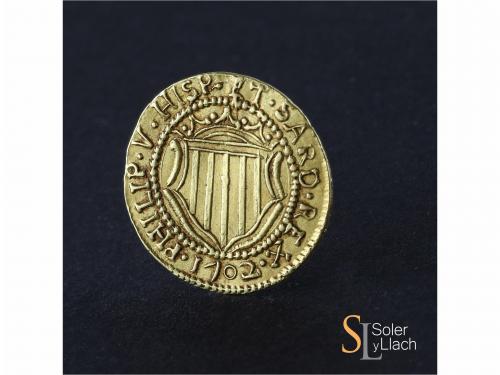 FELIPE V. Escudo de Oro. 1702. CAGLIARI. 3,20 grs. (Leves ra