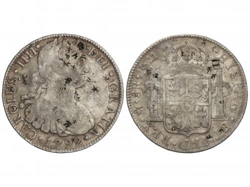CARLOS IV. 8 Reales. 1792. MÉXICO. F.M. 26,56 grs. Resellos 