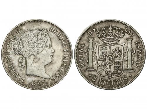 ISABEL II. 2 Escudos. 1867. MADRID. 26 grs. (Múltiples rayit